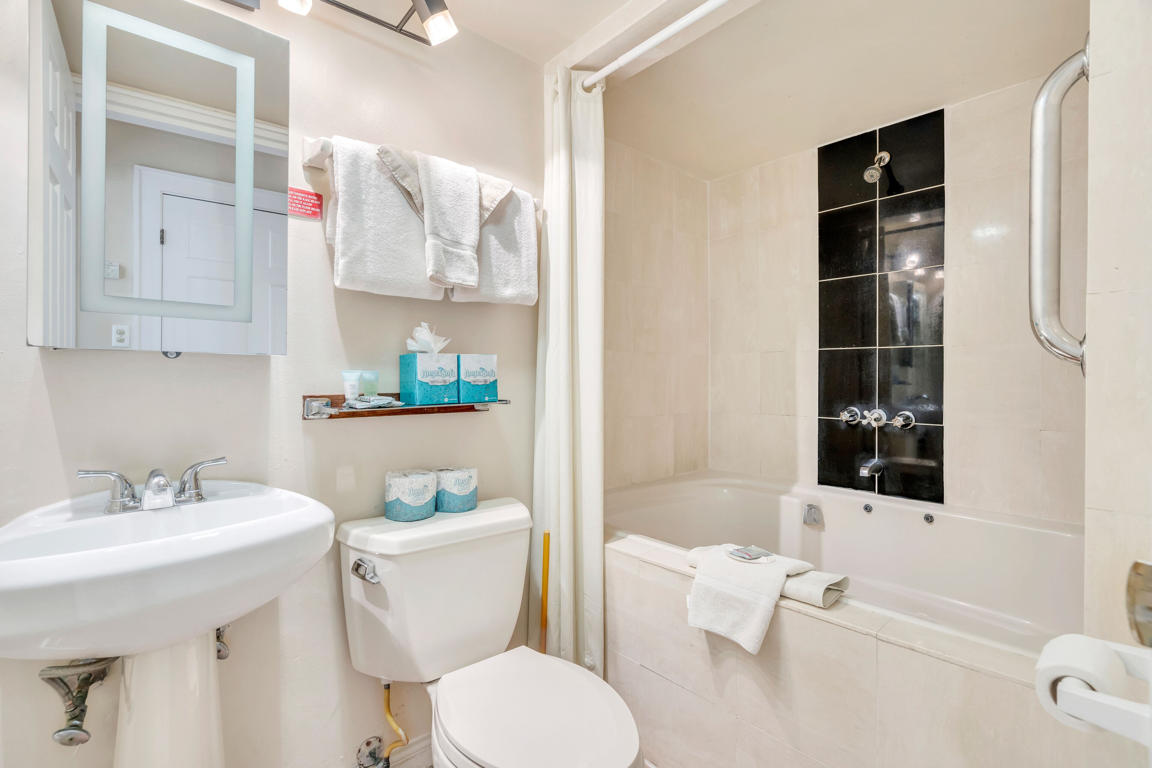 superior suite, multiple beds | bathroom | hair dryer, towels