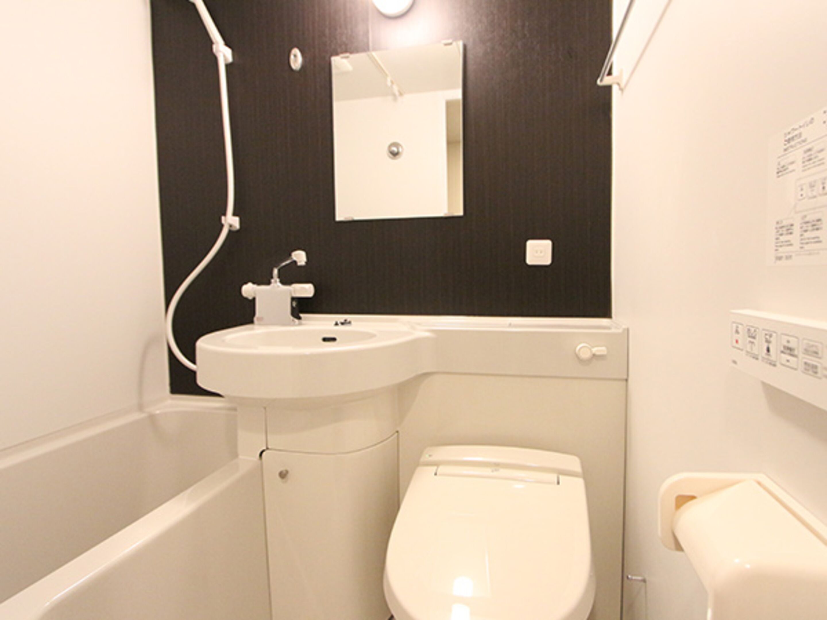 Combined shower/tub, free toiletries, hair dryer, slippers