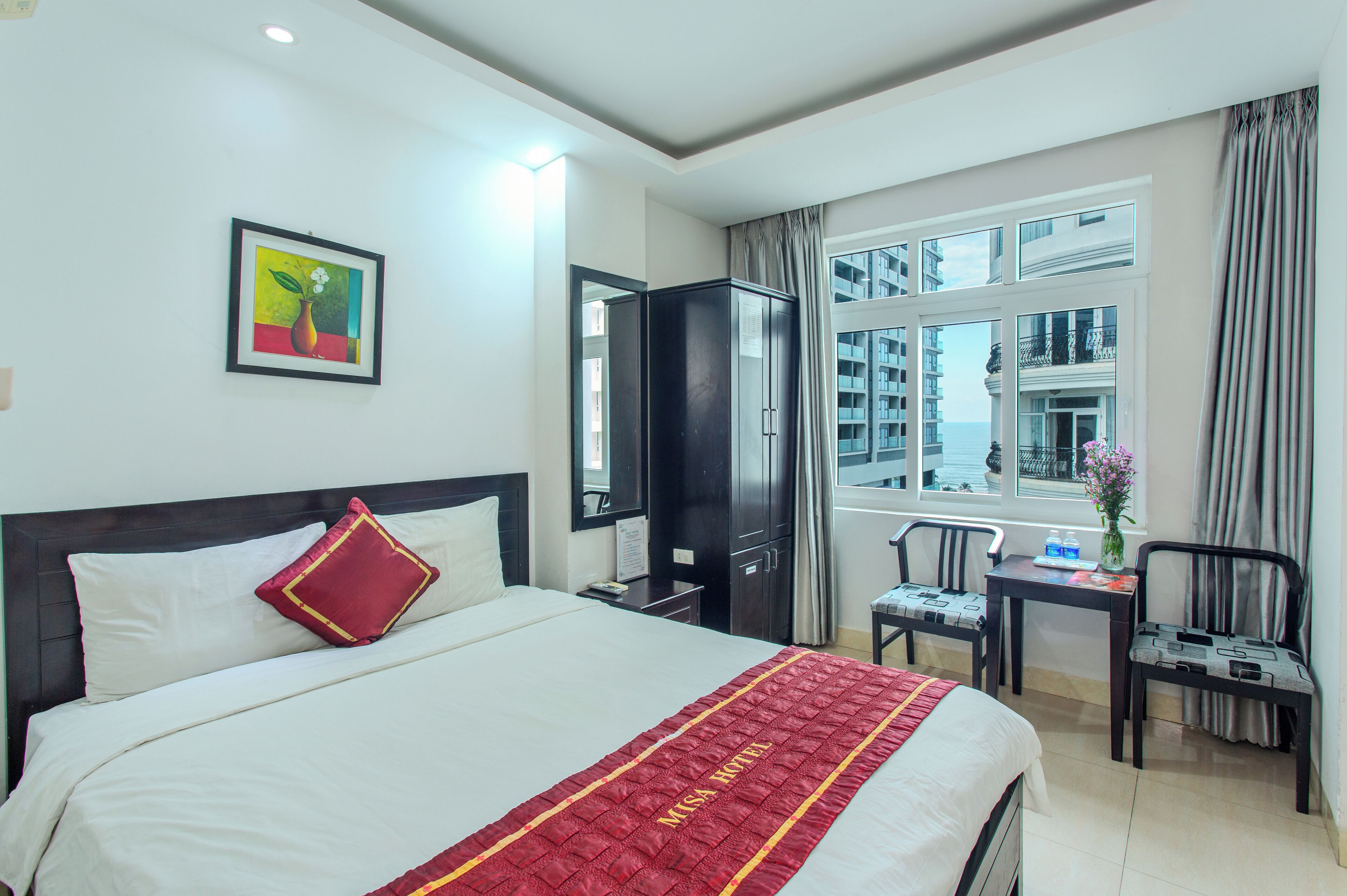 Deluxe Double Room, Sea View | Minibar, desk, blackout drapes, soundproofing