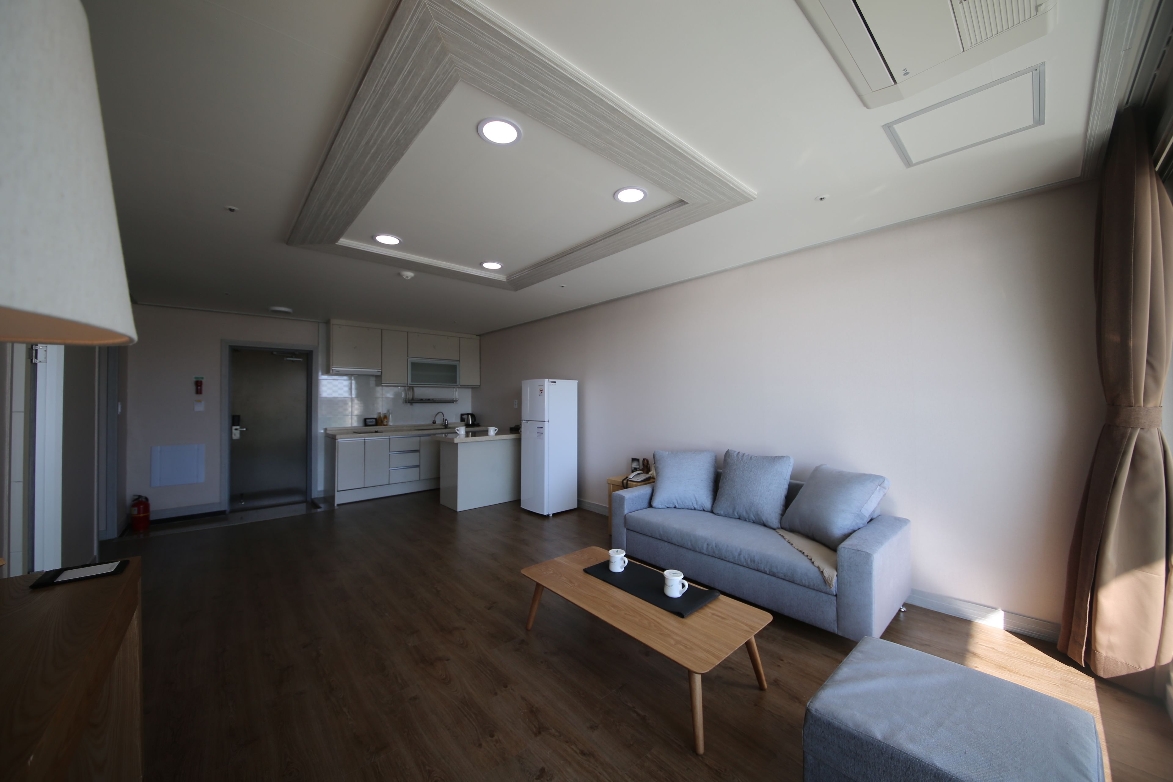 family room, city view | living room | flat-screen tv, pay films, heated floors