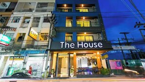 A hotel named "The House" with a modern facade, multiple windows, and a visible entrance. - The House Patong (Patong)
