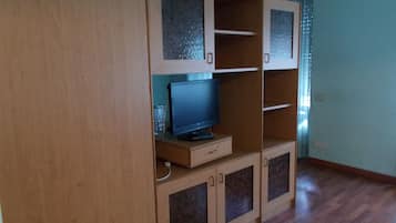 Family Apartment | Living area | 22-inch flat-screen TV with digital channels, TV