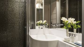 Shower, free toiletries, hair dryer, slippers