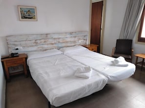 Cofres nos quartos, Wi-Fi de cortesia, roupa de cama