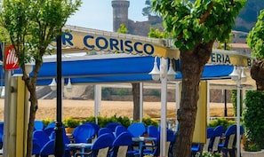 Outdoor dining - Hotel Corisco (Tossa de Mar)