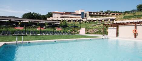 2 outdoor pools, pool umbrellas, sun loungers