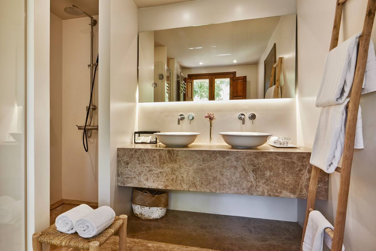 suite (masia) | bathroom | designer toiletries, hair dryer, bathrobes, slippers