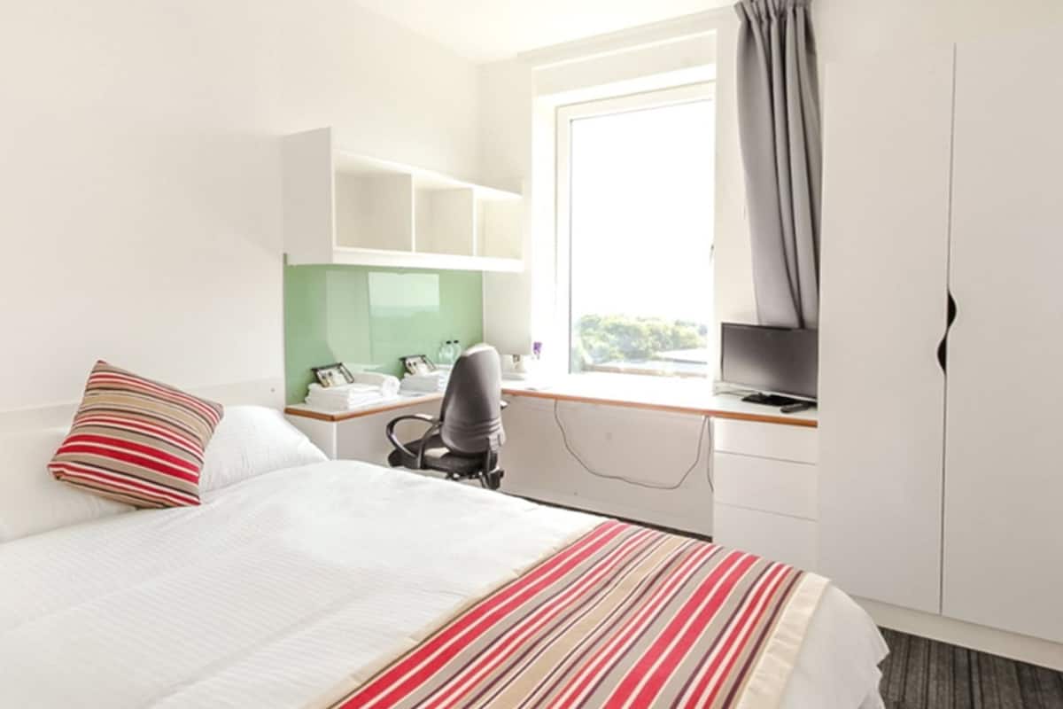 laptop workspace, iron/ironing board, free wifi, bed sheets