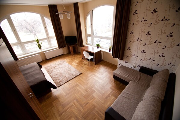 Superior Suite, 1 Bedroom | Living area | Flat-screen TV