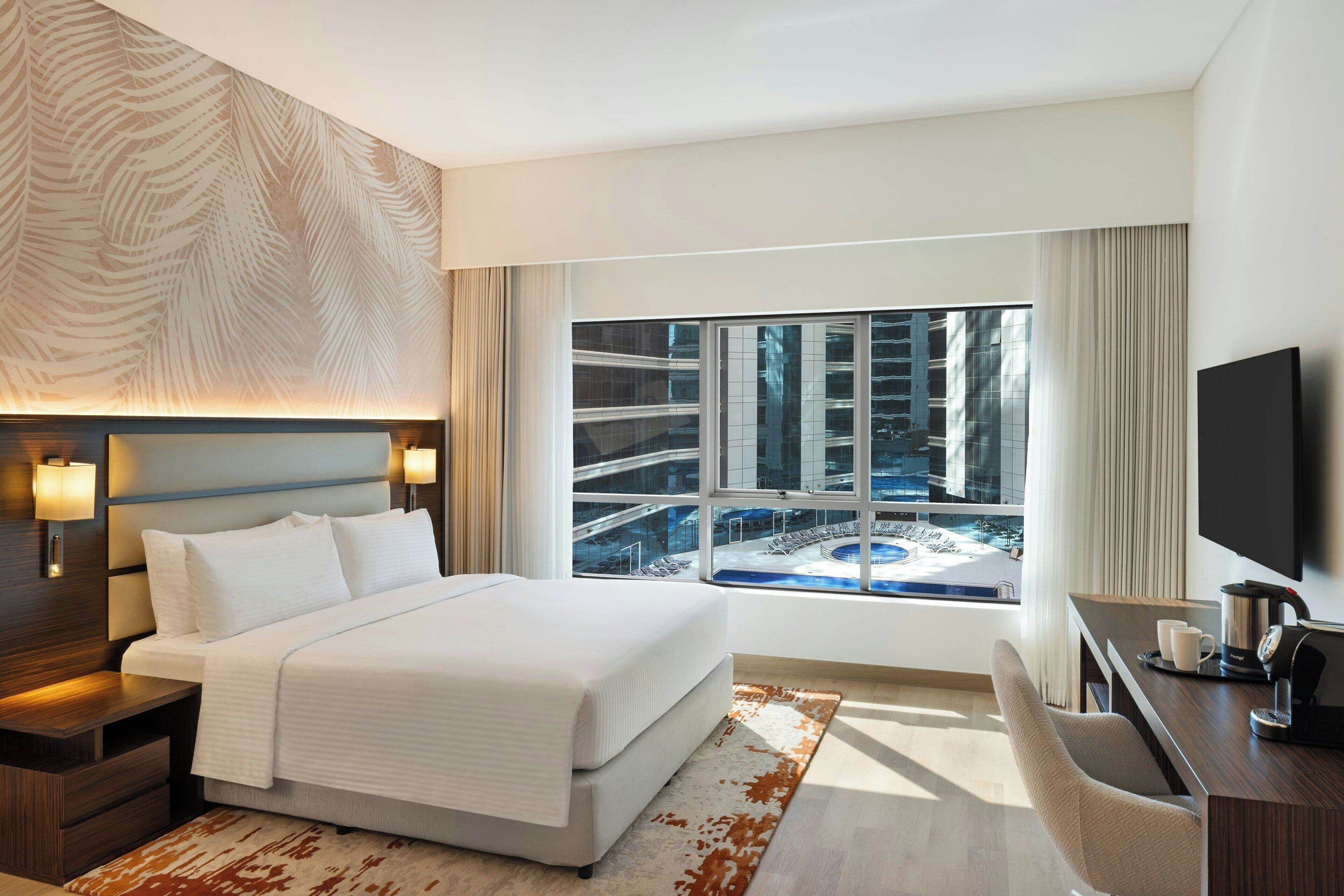 Deluxe Room, 1 King Bed, Non Smoking, Pool View | Pool | Outdoor pool