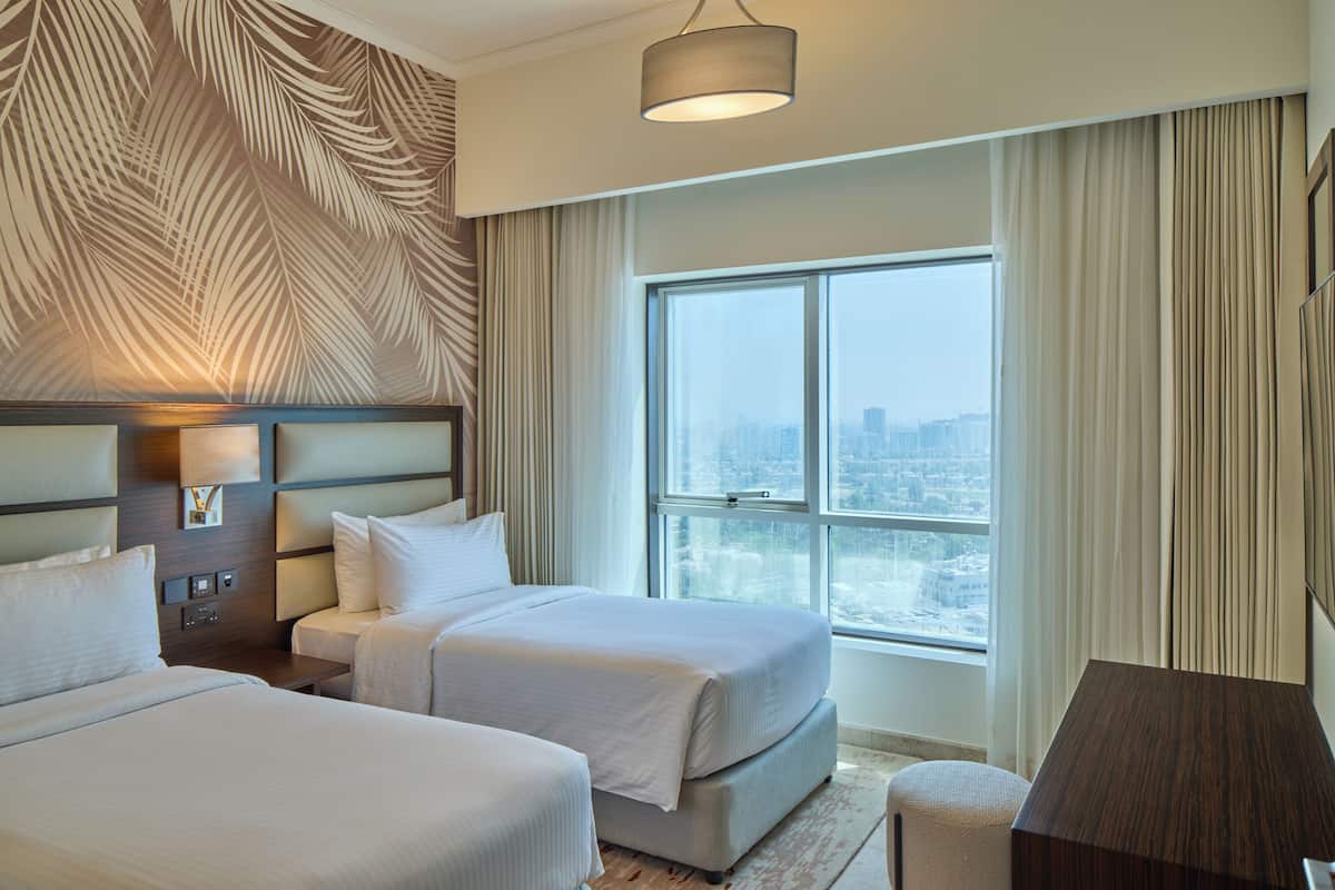 City Apartment, 2 Bedrooms | Minibar, in-room safe, individually decorated, individually furnished