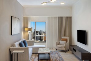 City Apartment, 2 Bedrooms | Living area | LED TV - Marriott Hotel Production City, Dubai (Dubai)