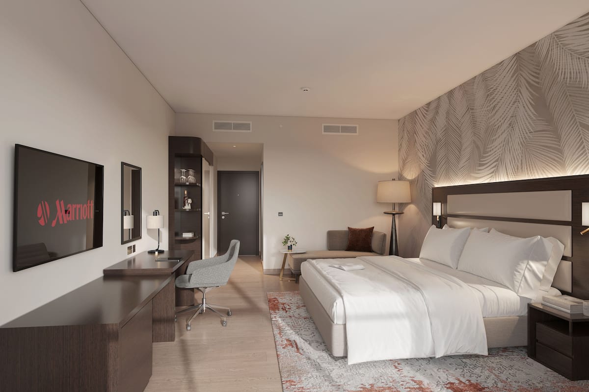 Habitación doble Deluxe, 1 cama King size | Minibar, caja de seguridad en la habitación y decoración personalizada