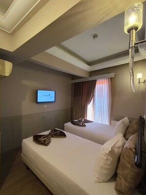 Chambre Deluxe Double ou avec lits jumeaux | Minibar, bureau, chambres insonorisées, Wi-Fi gratuit