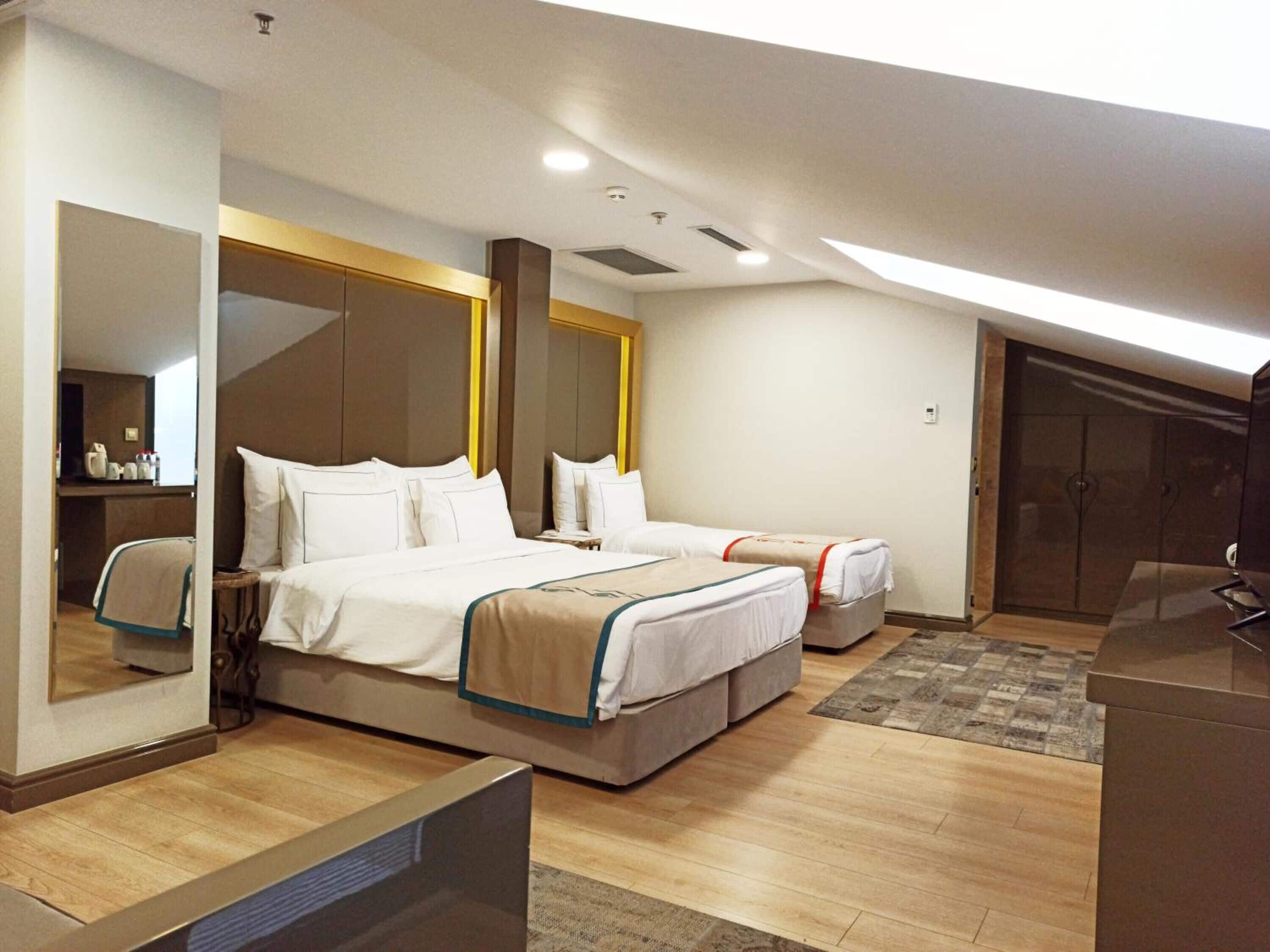 Basic Quadruple Room, Balcony | Premium bedding, minibar, in-room safe, desk