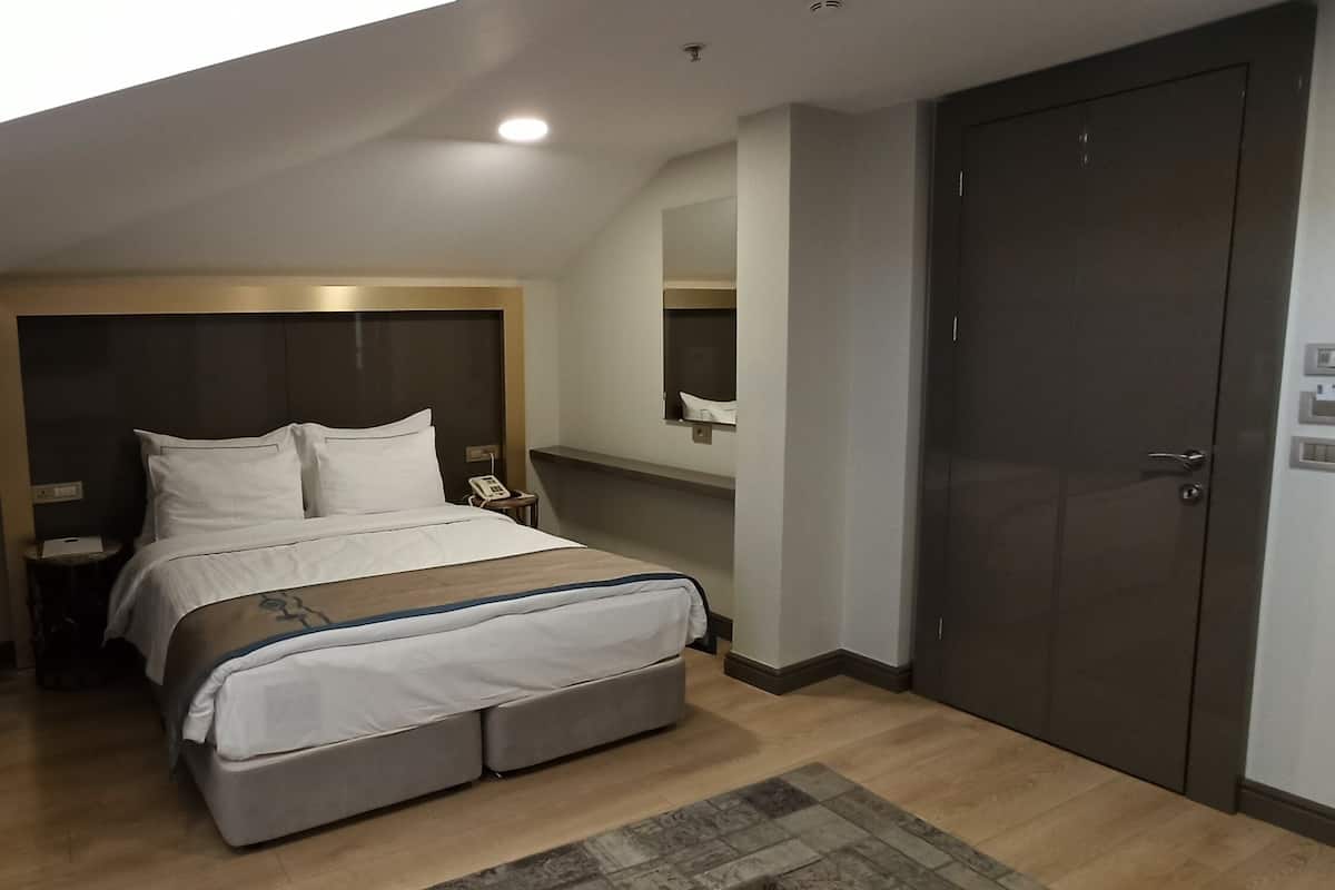 Suite Standar | 2 kamar tidur, seprai premium, minibar, dan brankas