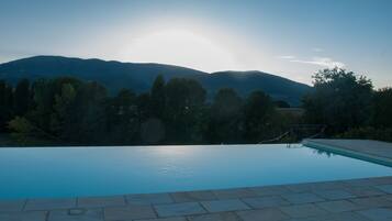 Seasonal outdoor pool, pool umbrellas, sun loungers