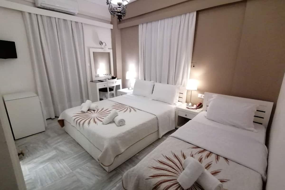 triple room, mountain view | minibar, in-room safe, iron/ironing board, free wifi