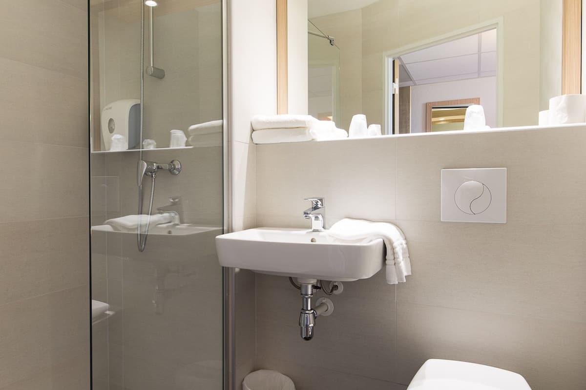 shower, rainfall showerhead, eco-friendly toiletries, hair dryer