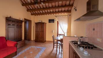 Standard Apartment, 1 Bedroom | Living area | Flat-screen TV