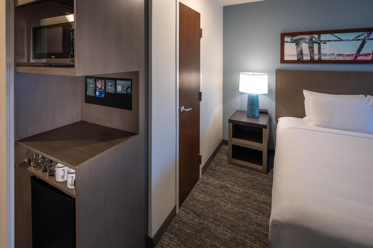 Desk, blackout drapes, iron/ironing board, free cribs/infant beds