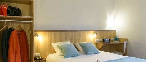 Desk, blackout drapes, soundproofing, iron/ironing board