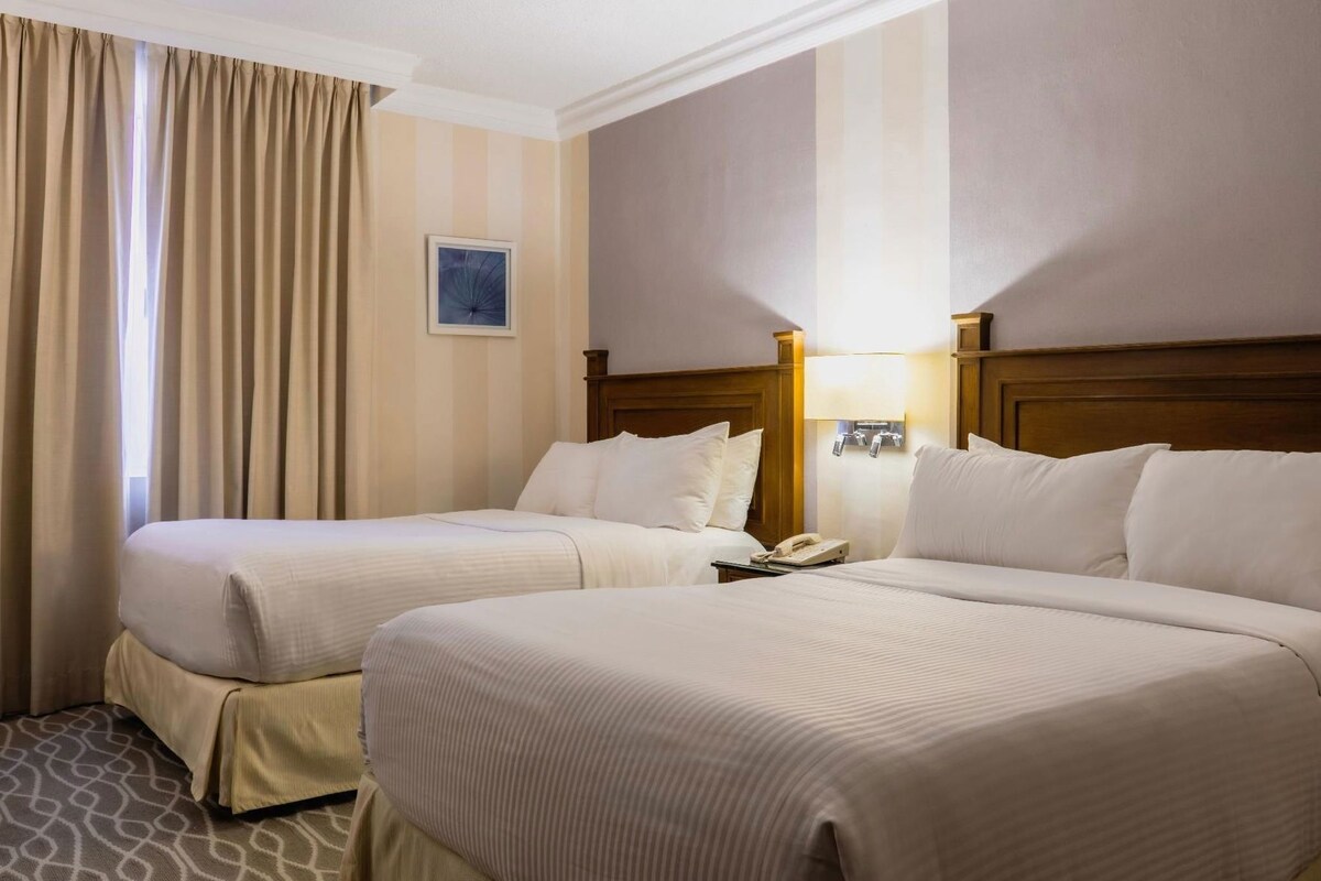 Premium bedding, in-room safe, desk, soundproofing