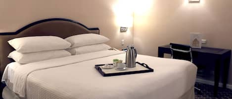 Premium bedding, in-room safe, desk, soundproofing