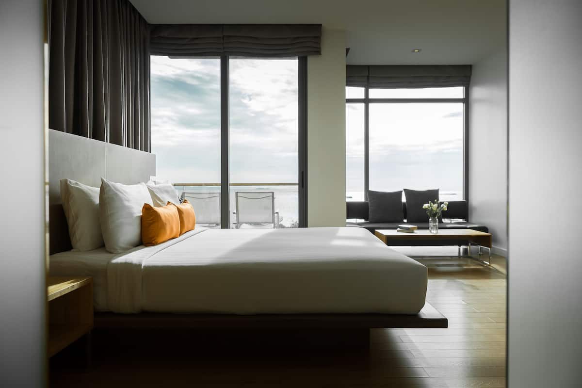 Deluxe Room, Sea View | Minibar, in-room safe, desk, free WiFi