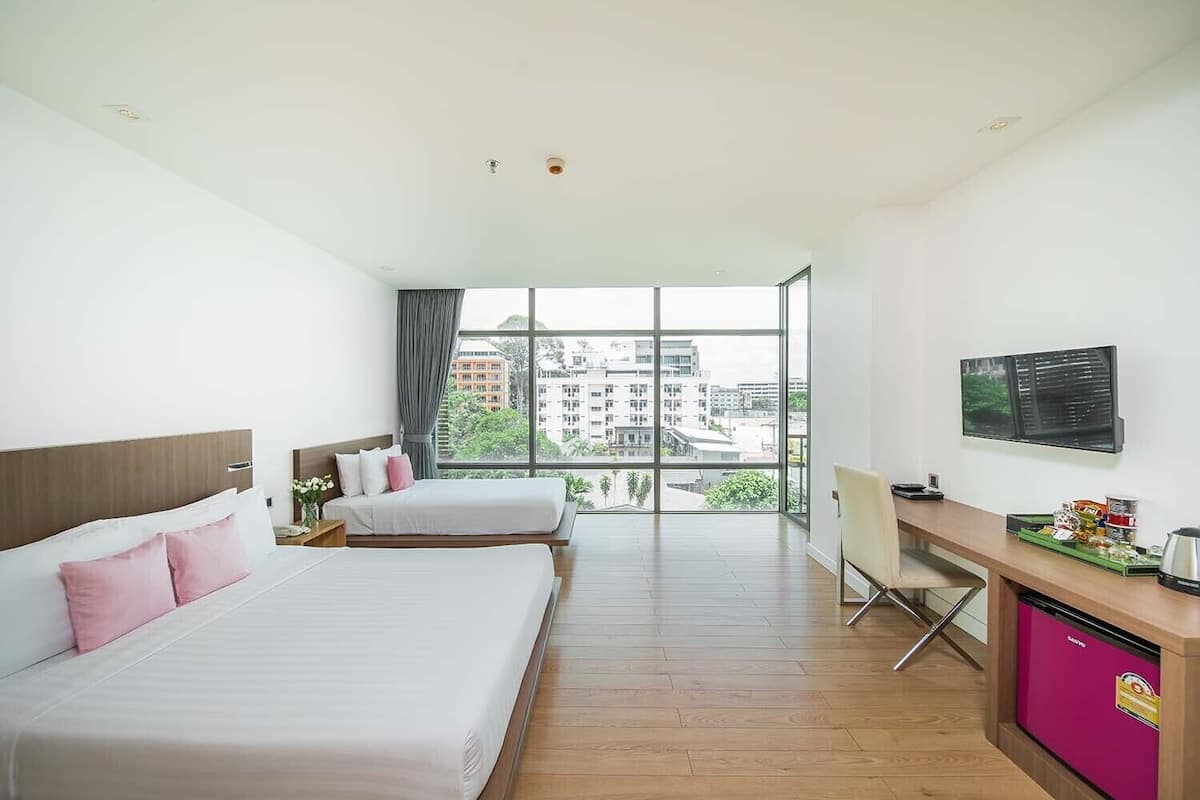 Deluxe Triple Room, City View (3 person) | Minibar, in-room safe, desk, free WiFi