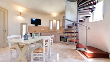 Fridge, electric kettle, high chair, cookware/dishes/utensils