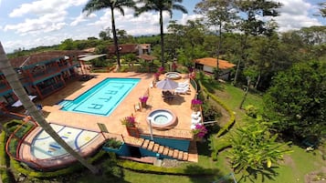 2 outdoor pools, pool umbrellas, sun loungers