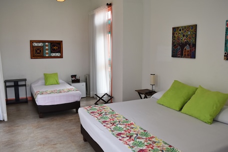 Triple Room | Minibar, in-room safe, individually furnished, free cribs/infant beds