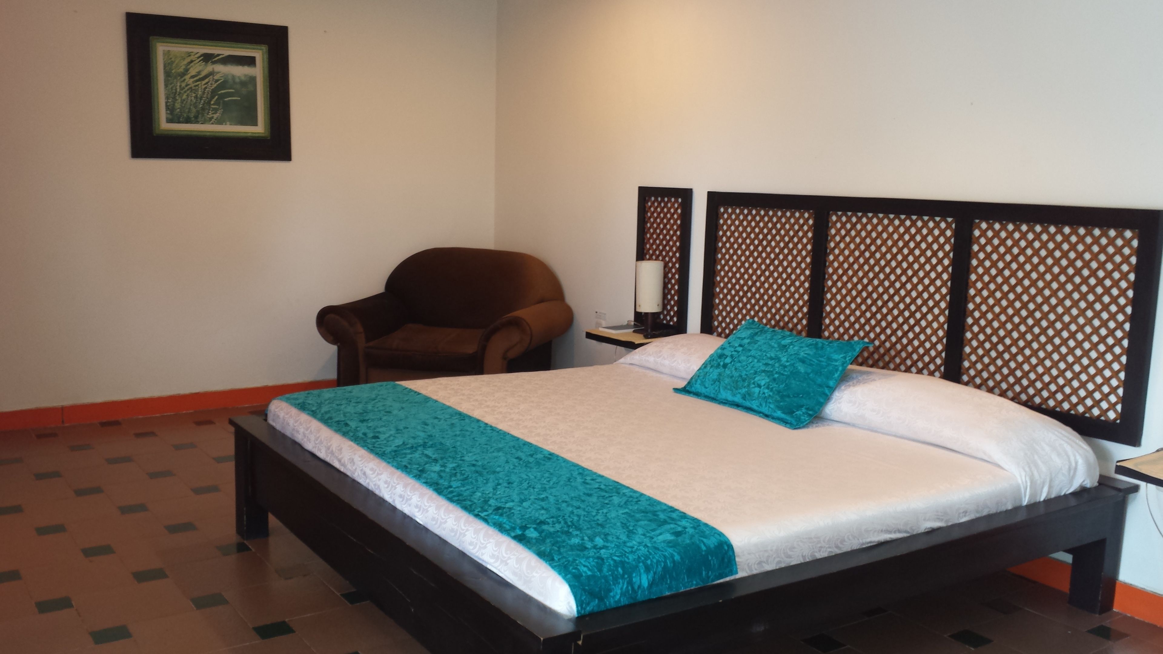 Habitación doble | Minibar, caja fuerte, mobiliario individual y cunas gratuitas