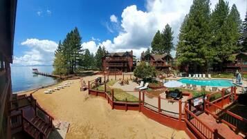 On the beach, sun loungers, beach towels, beach volleyball