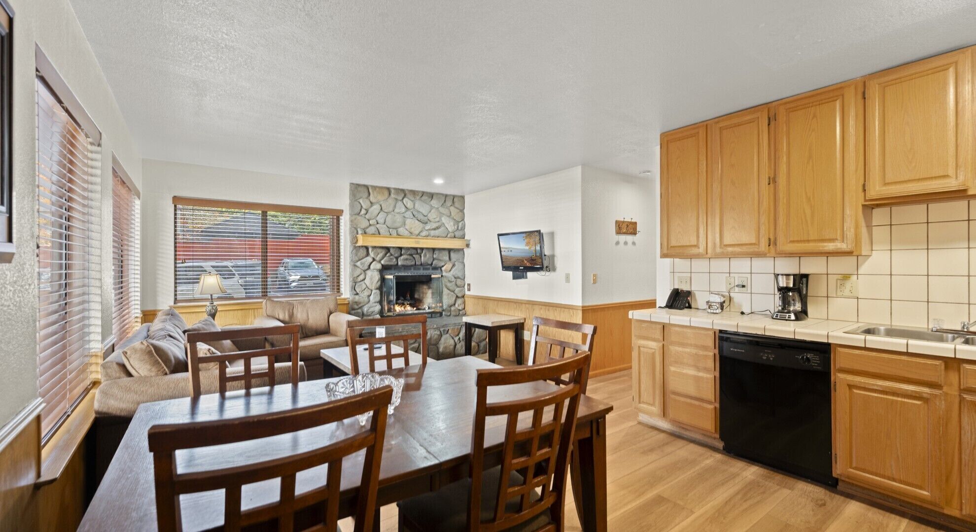 Standard Condo, 2 Bedrooms, Fireplace | Living area | 42-inch flat-screen TV with cable channels, fireplace, books