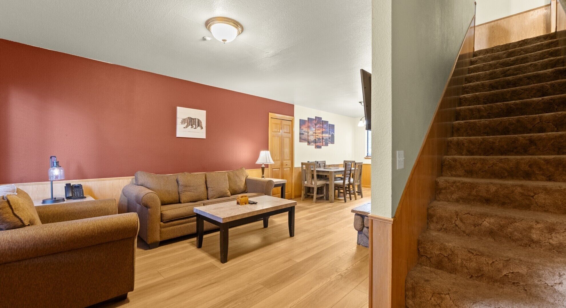 Standard Loft, 2 Bedrooms, Fireplace | Living area | 42-inch flat-screen TV with cable channels, fireplace, books