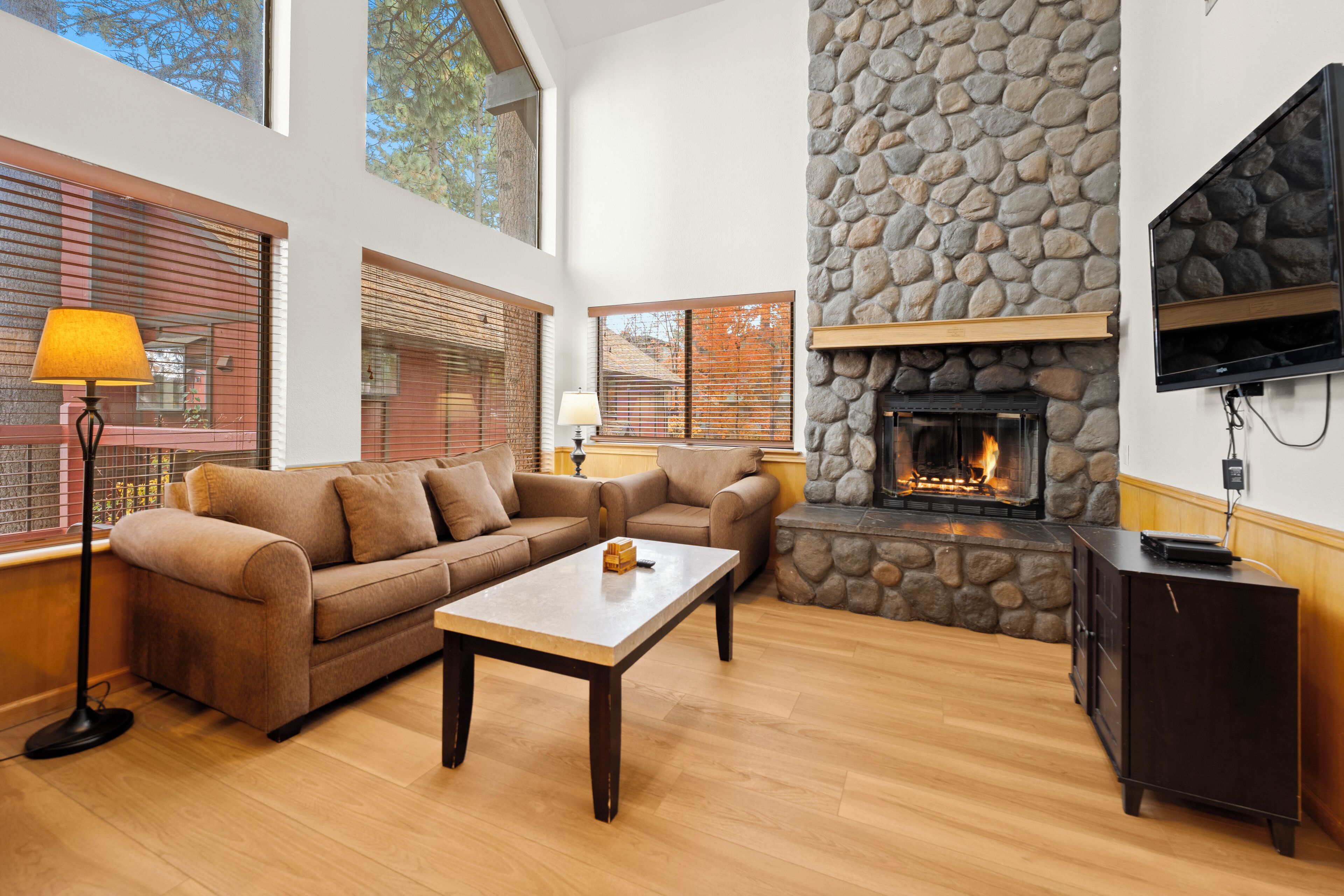 Standard Condo, 2 Bedrooms, Fireplace | Living area | 42-inch flat-screen TV with cable channels, fireplace, books