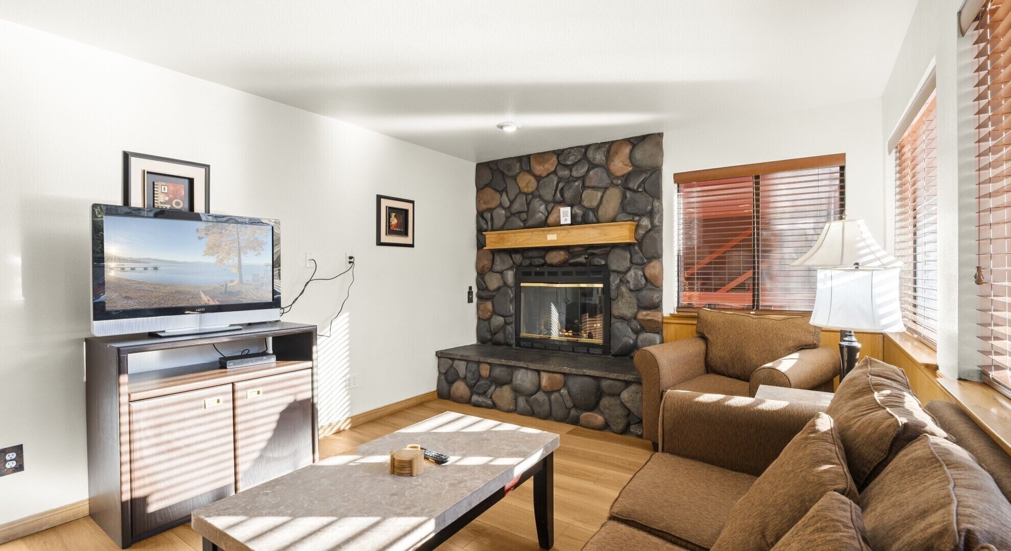 42-inch flat-screen TV with cable channels, fireplace, books