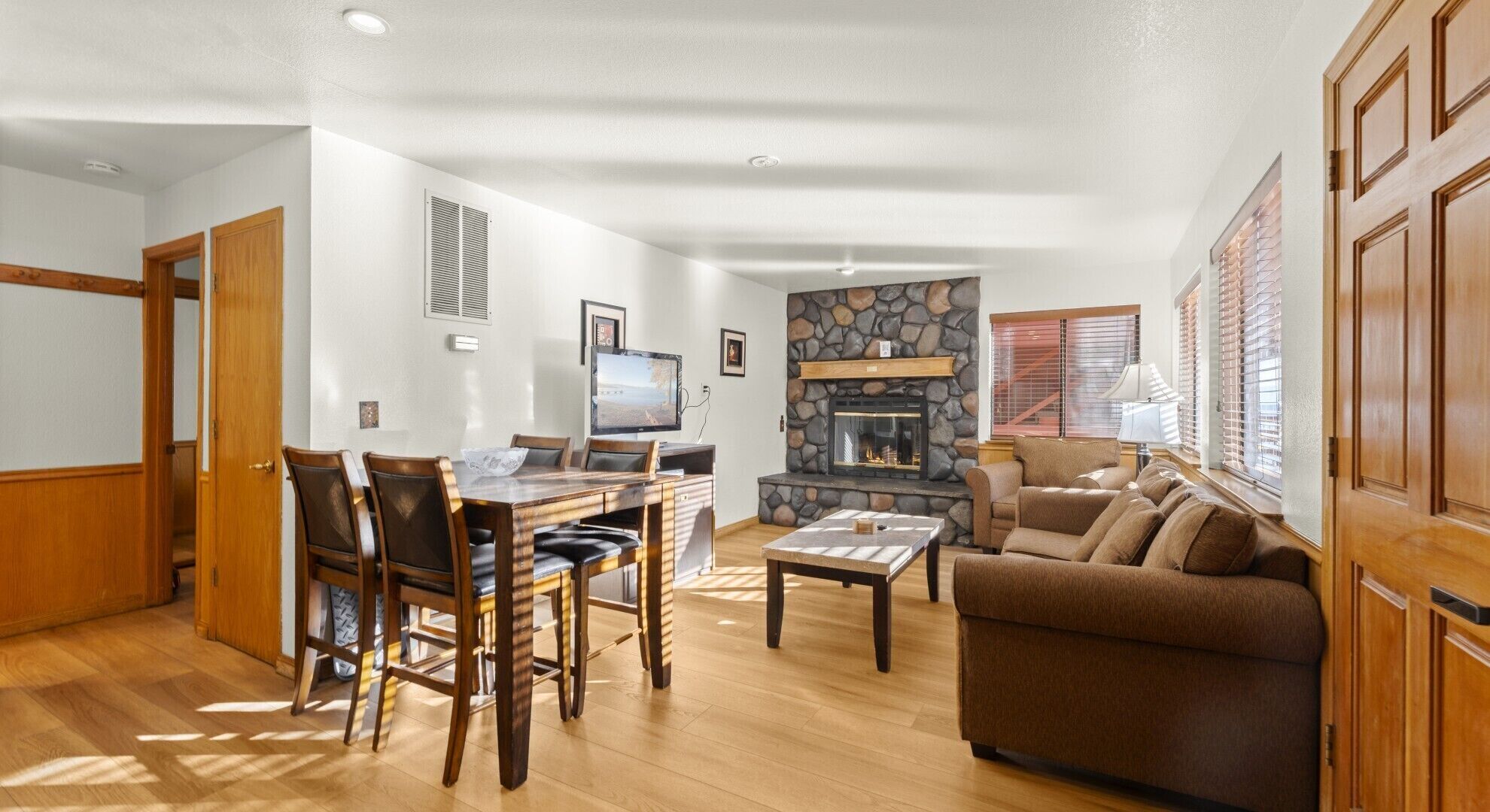 42-inch flat-screen TV with cable channels, fireplace, books