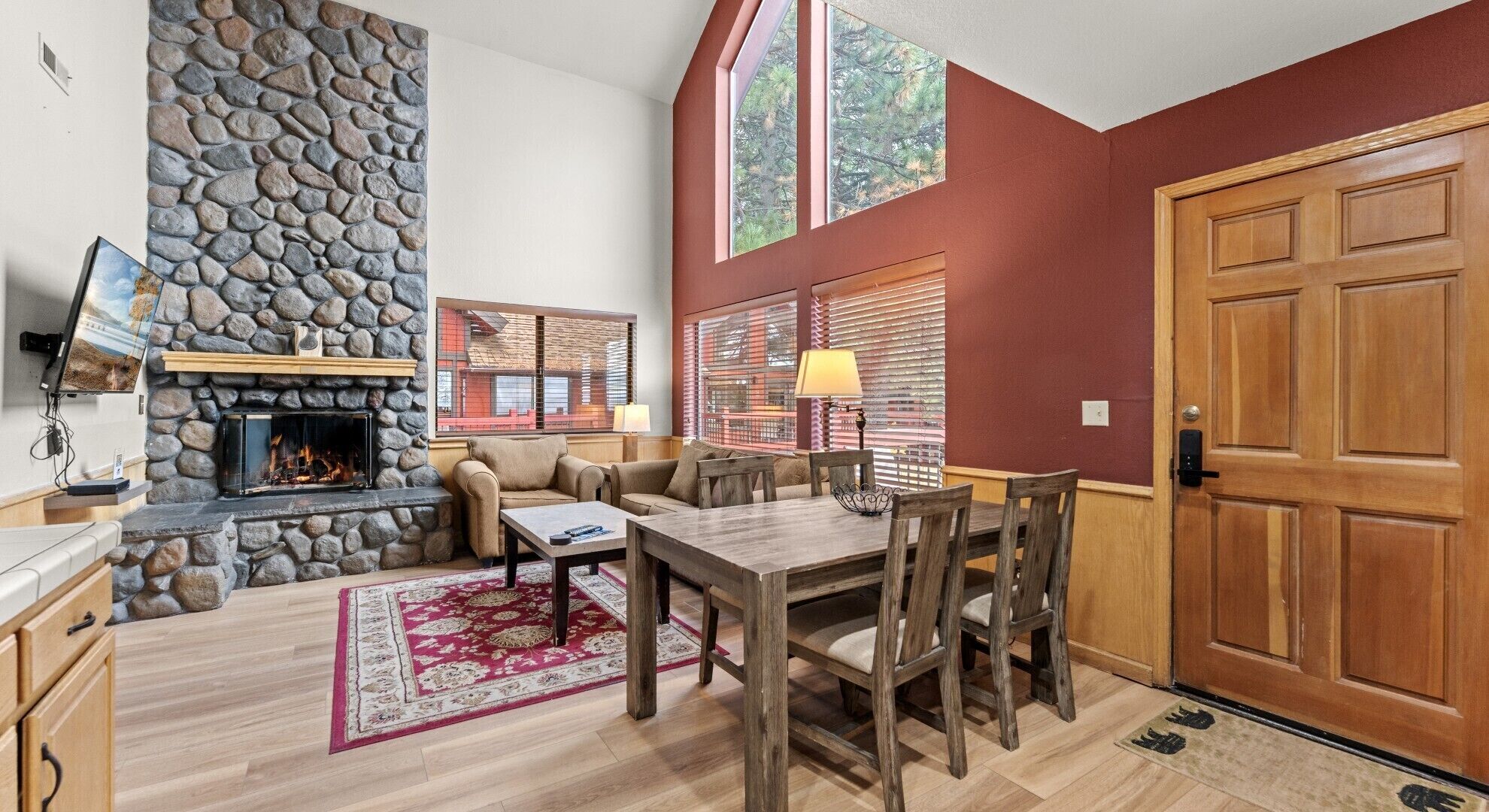 Standard Condo, 2 Bedrooms, Fireplace | Living area | 42-inch flat-screen TV with cable channels, fireplace, books