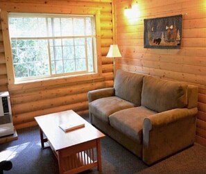 Wolf's Den | Living area | Flat-screen TV - Box Canyon Cabins (Seward)