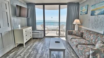 Condo, 1 Bedroom, Balcony, Ocean View | Living room | Flat-screen TV