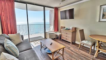 Condo, 1 Bedroom, Balcony, Ocean View | Living area | Flat-screen TV