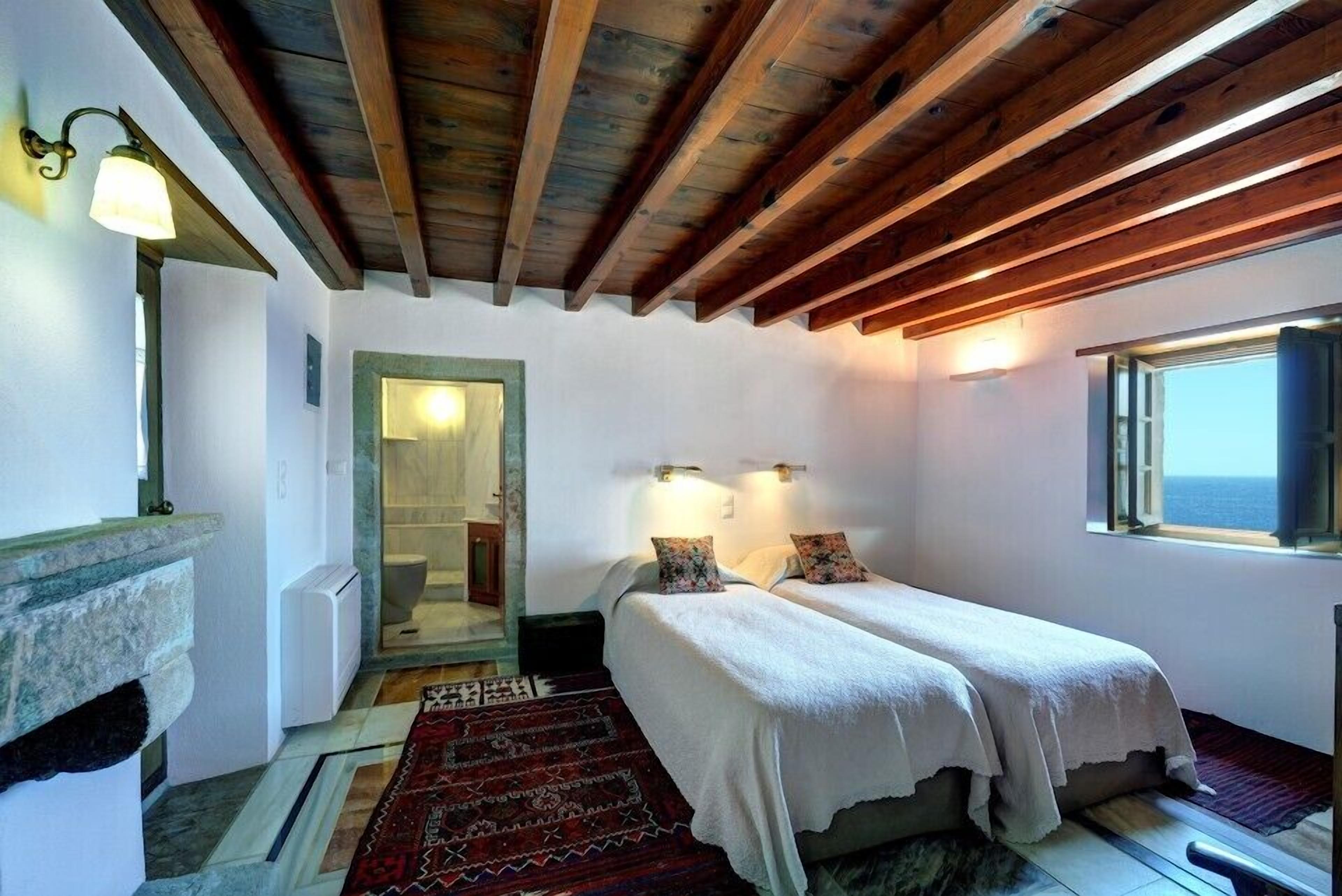 standard double room, sea view | living area | flat-screen tv