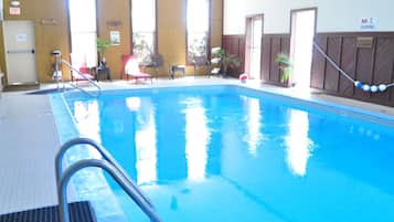 Indoor pool, open 7:00 AM to 10:00 PM, pool loungers