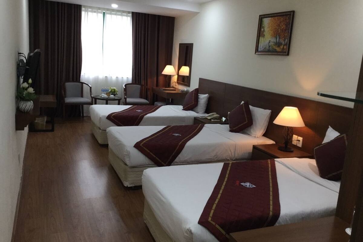 Triple Room | Minibar, desk, blackout drapes, free WiFi
