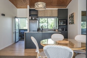 Deluxe Ocean View 2 Bedroom Villa | Private kitchen | Microwave, toaster, cookware/dishes/utensils, dining tables