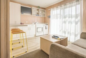 Chalet (Garden Motels) | 1 chambre, accès au Wi-Fi (inclus), literie fournie