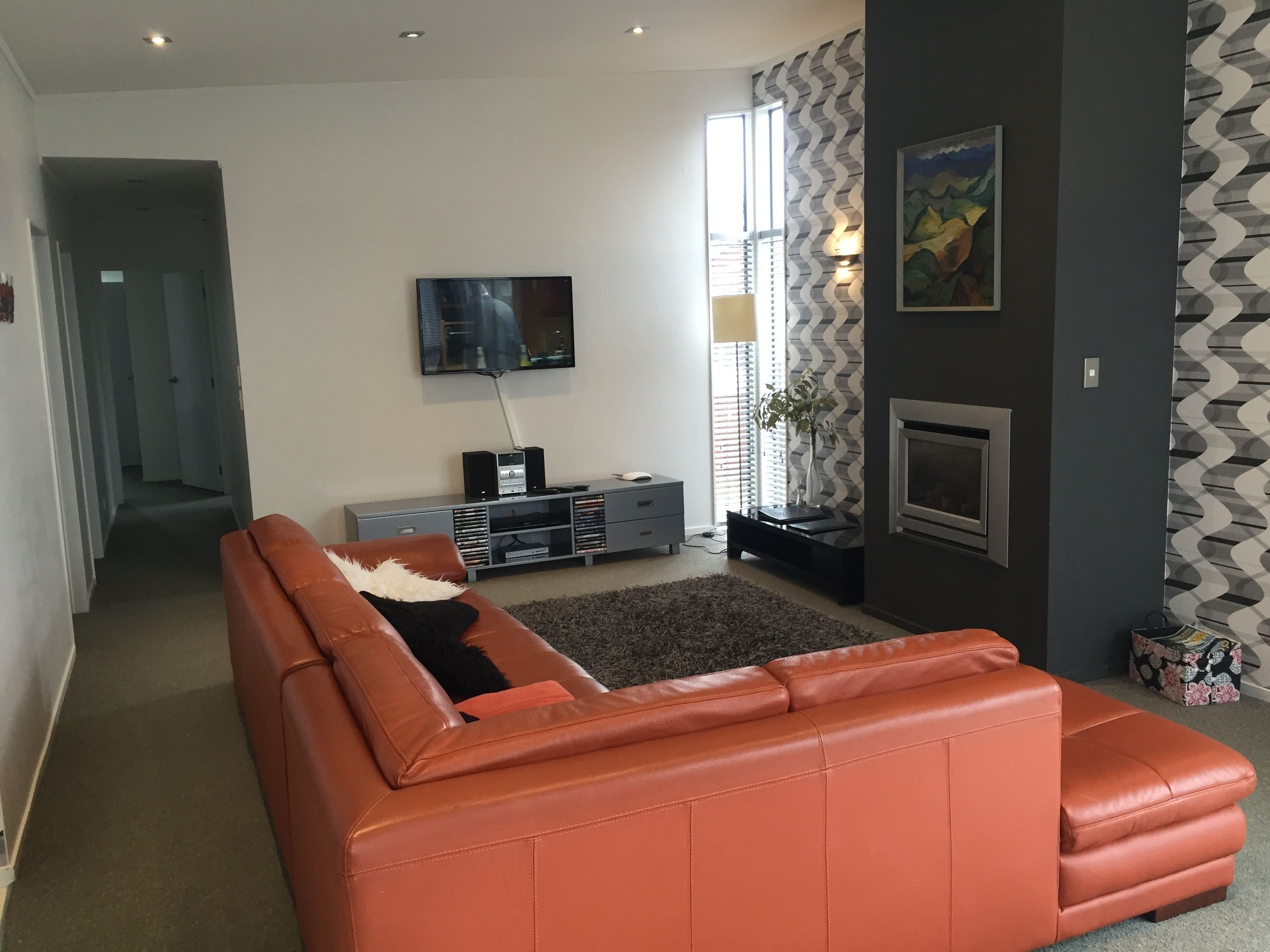 Executive House, 4 Bedrooms, 2 Bathrooms | Living room | 55-inch flat-screen TV with digital channels, TV